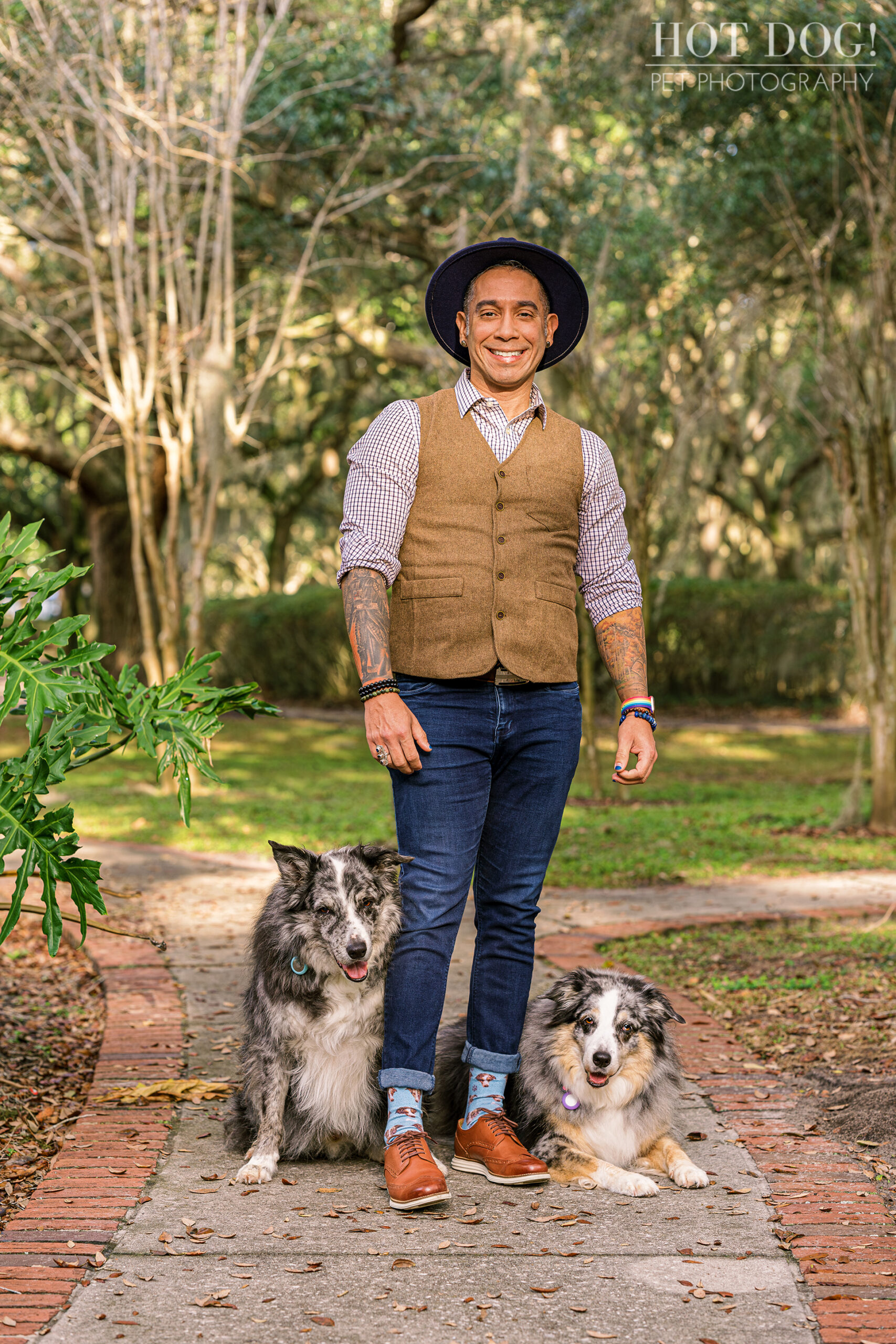 Andres and his beloved Border Collies, Allie and Flash, sharing a joyful moment.