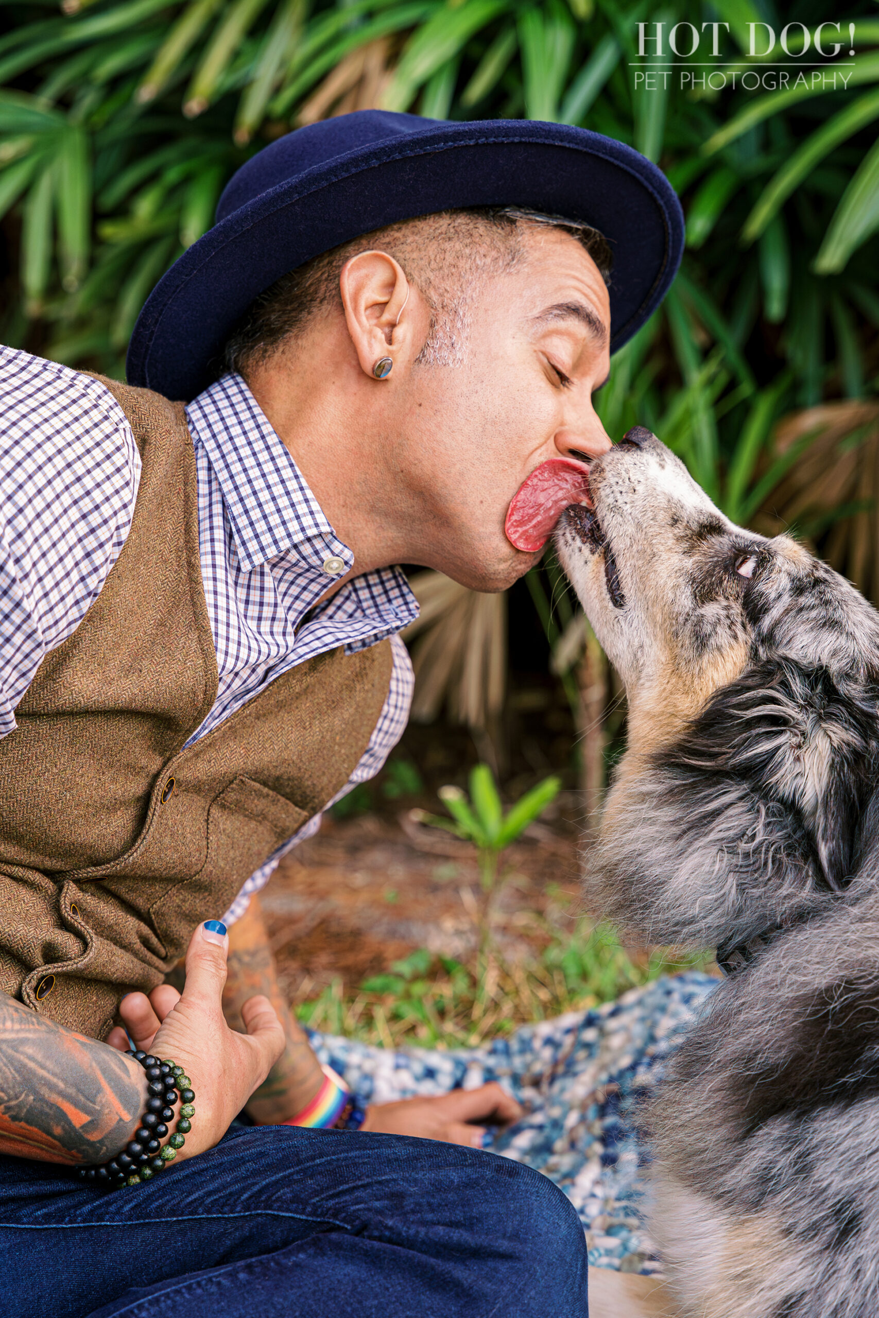 Andres and his beloved Border Collie Flash, sharing a sloppy kiss.