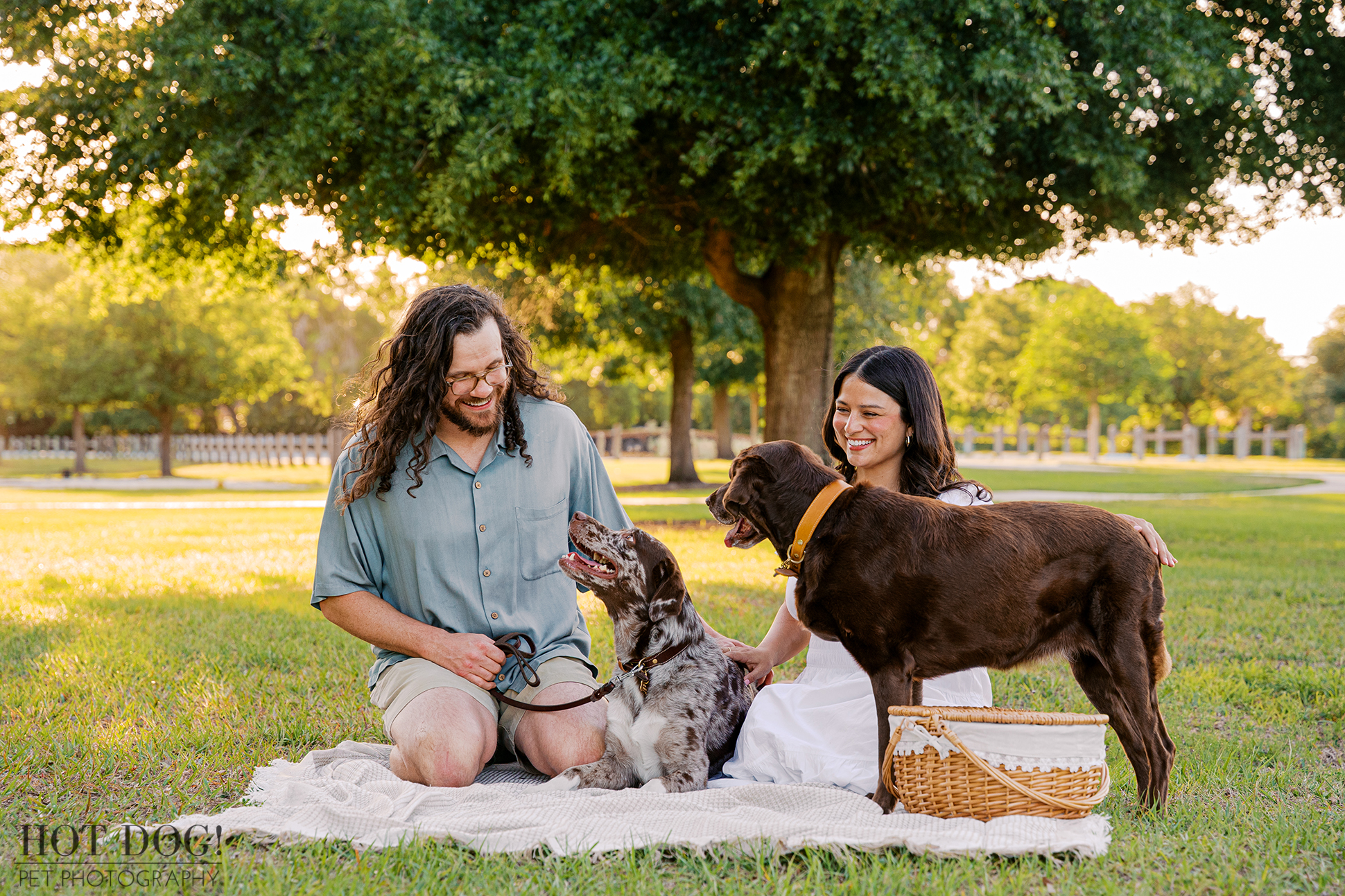 Anne, Jared, Gemma, and Ellie enjoy a candid family portrait together at Lake Druid Park during their Orlando dog photography session.