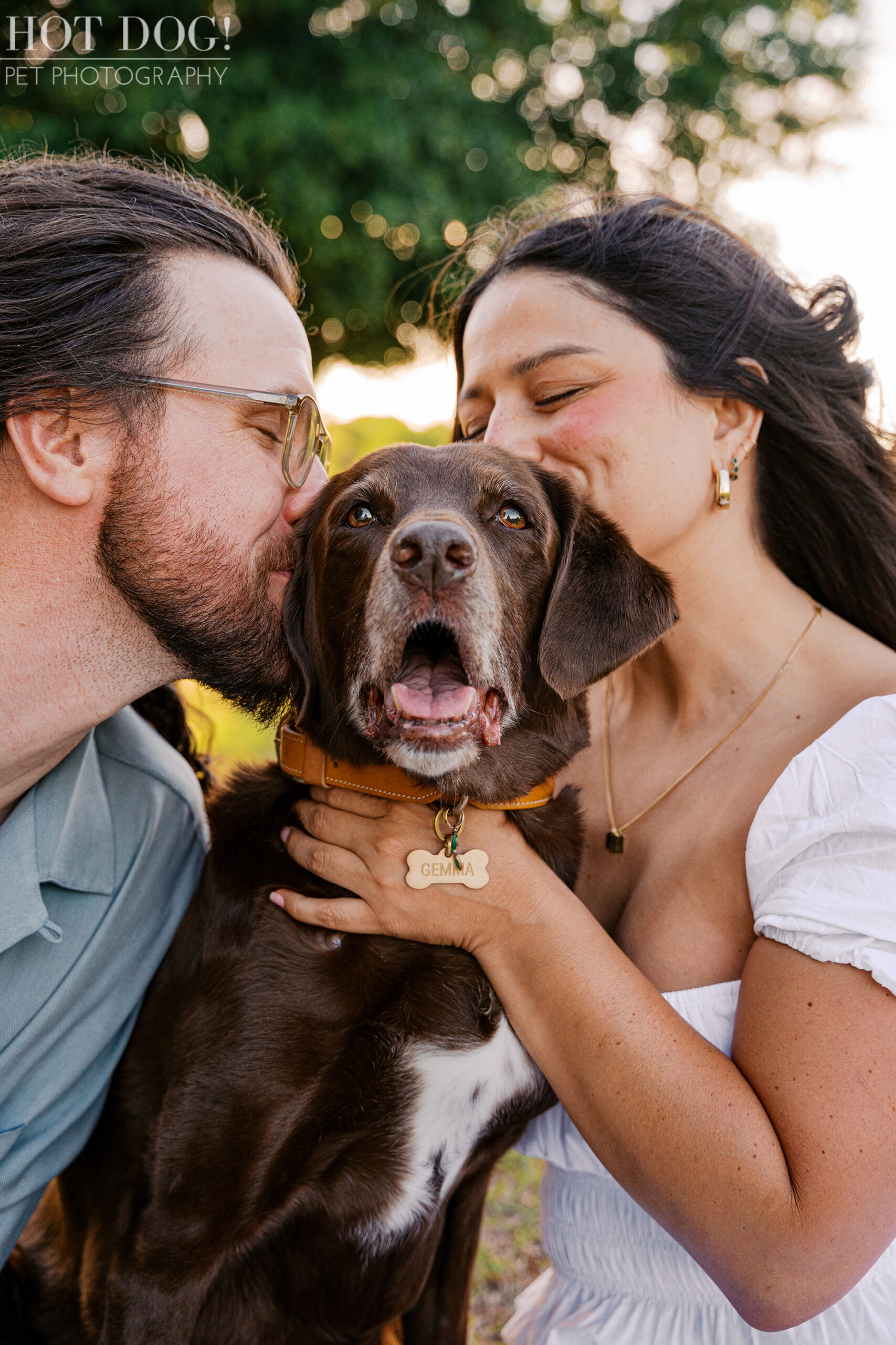 Anne and Jared share a sweet moment with Gemma, their senior Lab mix, during a family dog photography session in Orlando.