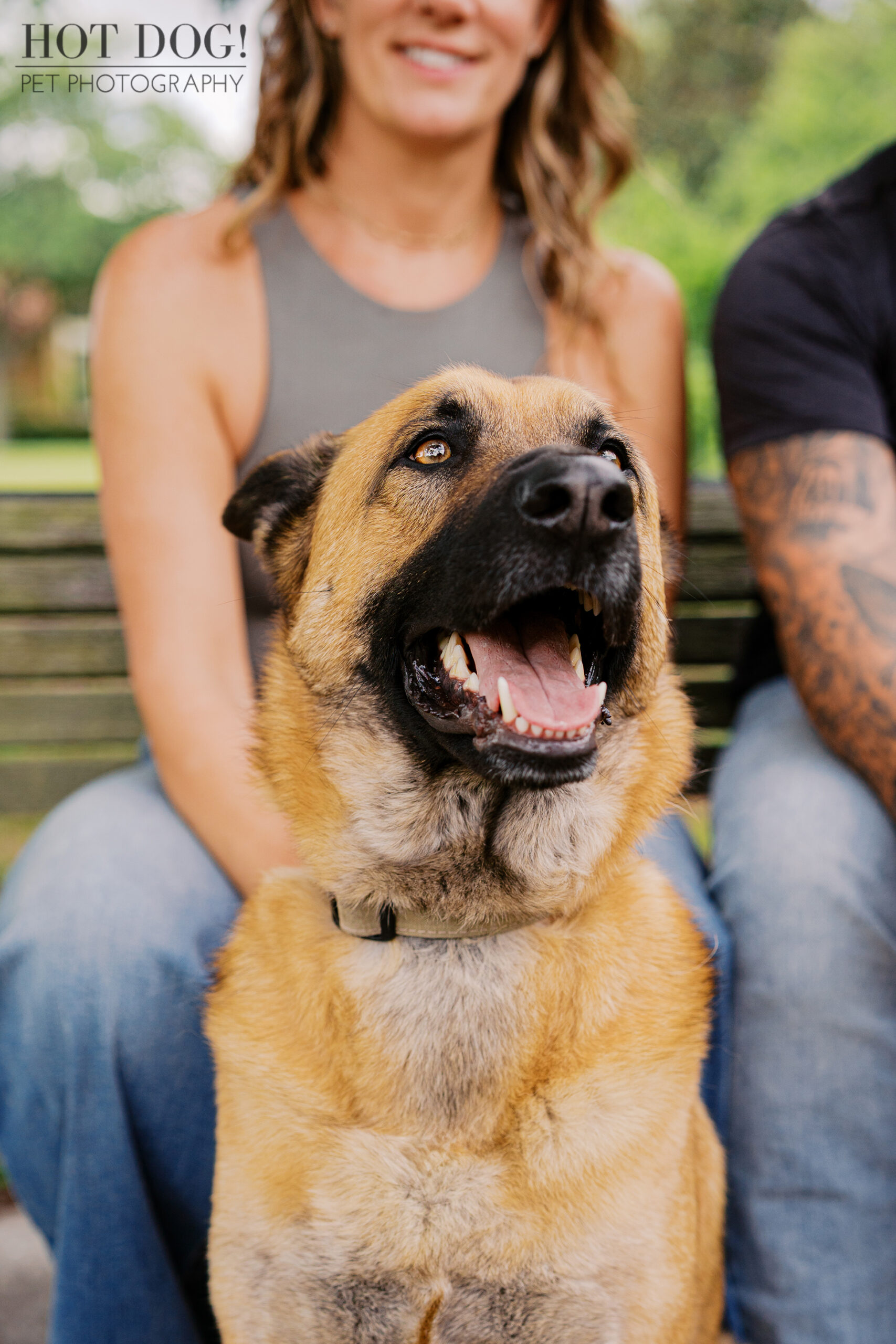 Close-up portrait of Maverick smiling while sitting with his family outdoors in Baldwin Park.