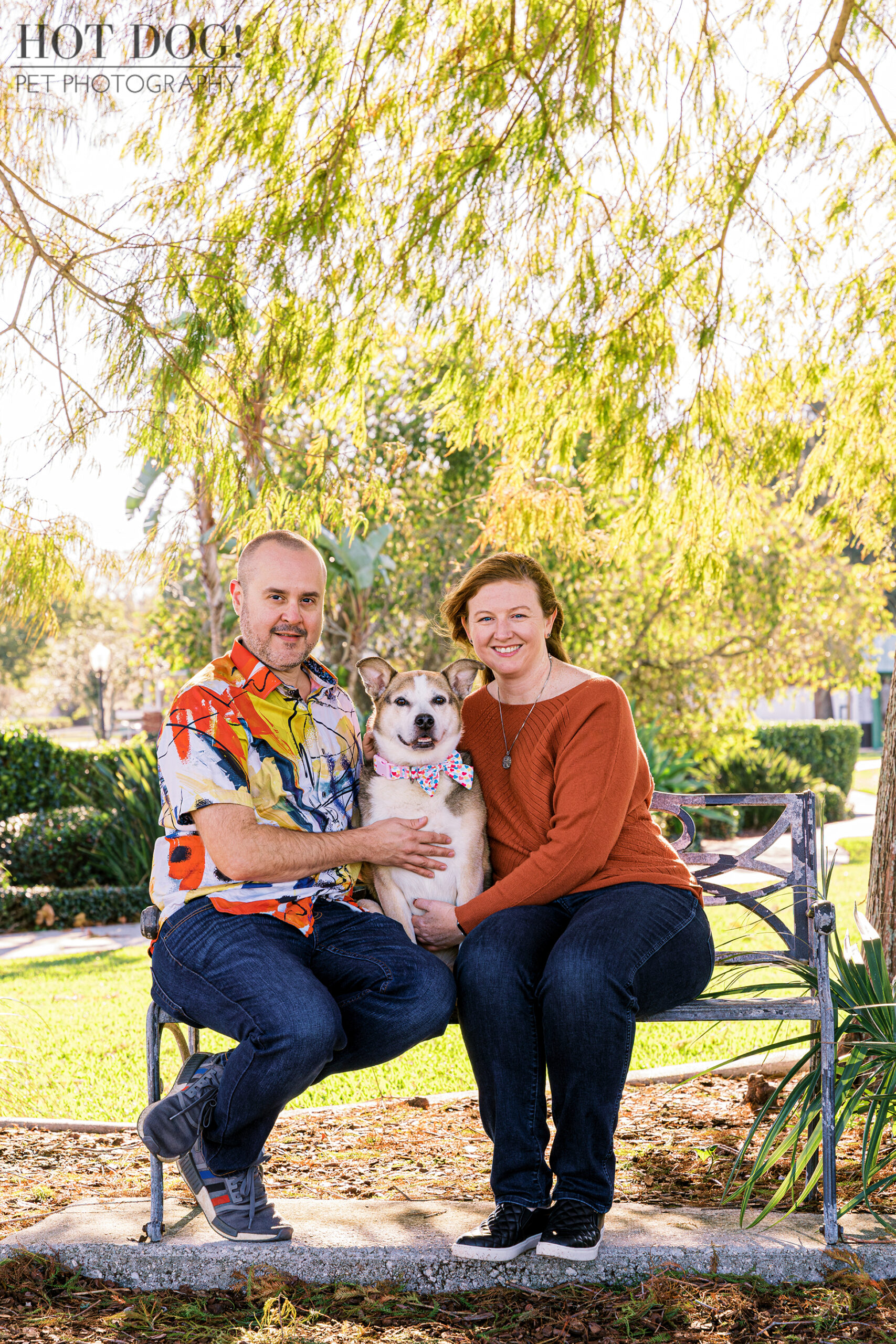 Hot Dog! Pet Photography captures the love and bond between Zoe the Aussie mix and her mom and dad in this professional pet photo session.